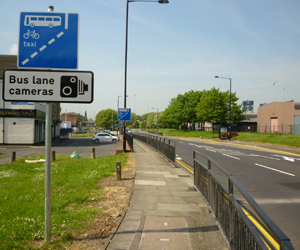 Bus lane cameras sign by the side of the road