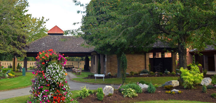 Exterior of St Hilda's Chapel with flowers