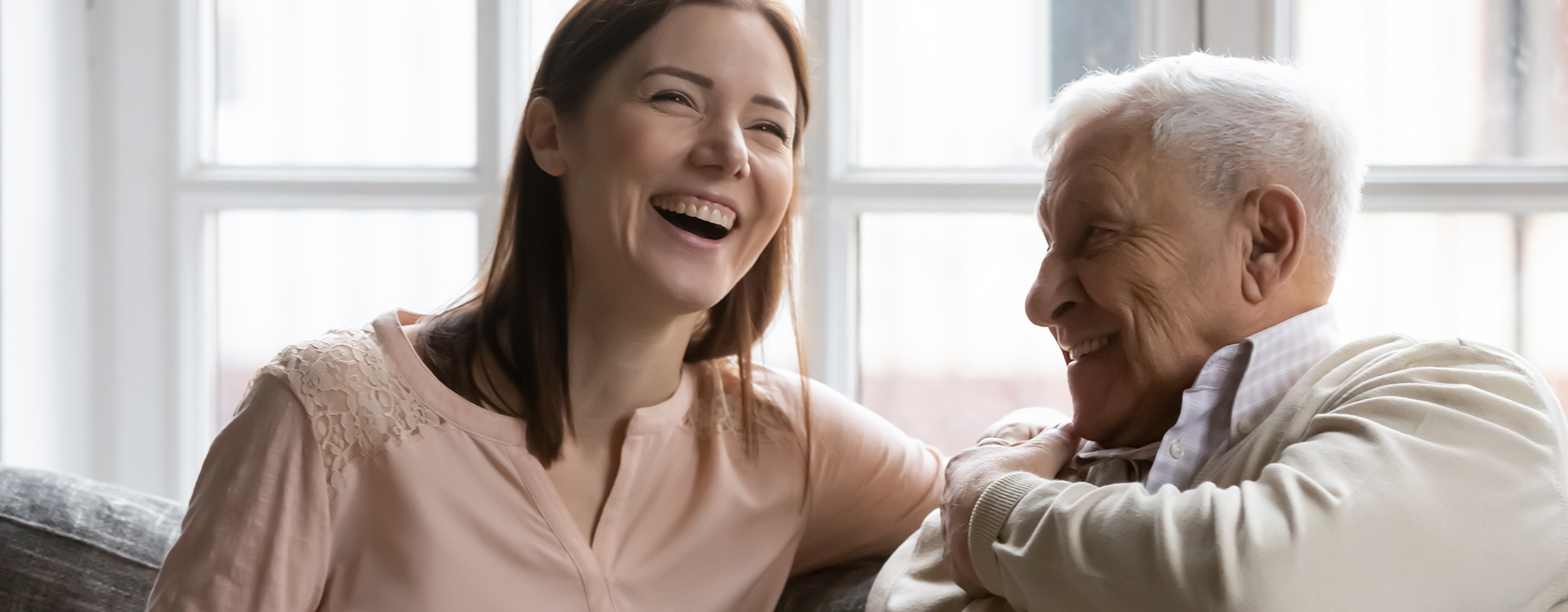 Two people smiling