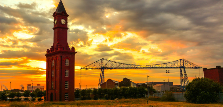 Middlesbrough Transporter Bridge and dock clock at sunset